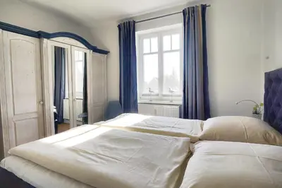 Ein Bett oder Betten in einem Zimmer der Unterkunft Villa Balticum, Whg 4