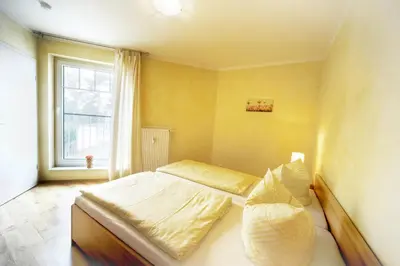 Ein Bett oder Betten in einem Zimmer der Unterkunft Seestern FW 2