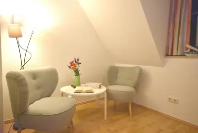 Ein Sitzbereich in der Unterkunft Ostseebrise FH 2