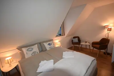 Ein Bett oder Betten in einem Zimmer der Unterkunft Ostseebrise FH 3