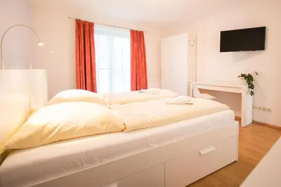 Ein Bett oder Betten in einem Zimmer der Unterkunft Ostseebrise Reetdach 2