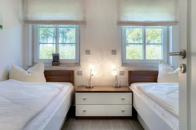 Ein Bett oder Betten in einem Zimmer der Unterkunft Deichgraf Strandresidenz 1 Ahrenshoop