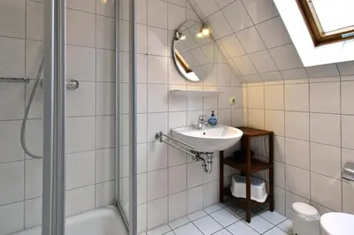 Ein Badezimmer in der Unterkunft Haus am Hafen Boddenzauber FW 4