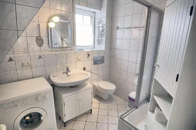 Ein Badezimmer in der Unterkunft Kranich VIII, FW 39