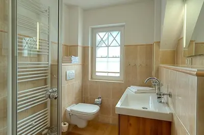 Ein Badezimmer in der Unterkunft Villa Carpe Diem, FW 8