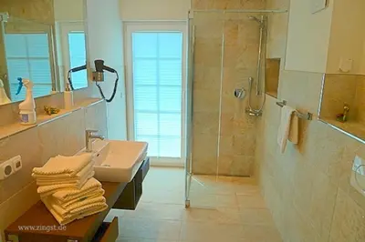 Ein Badezimmer in der Unterkunft Strandresidenz Deichgraf 3 Born