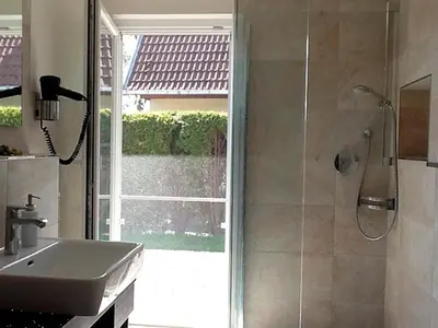 Ein Badezimmer in der Unterkunft Strandresidenz Deichgraf 3 Born