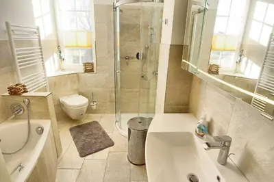 Ein Badezimmer in der Unterkunft Strandresidenz Deichgraf 6 Wustrow