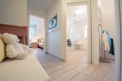 Ein Bett oder Betten in einem Zimmer der Unterkunft Haus Bullerbü