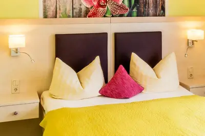 Ein Bett oder Betten in einem Zimmer der Unterkunft Pension Inselparadies Zingst
