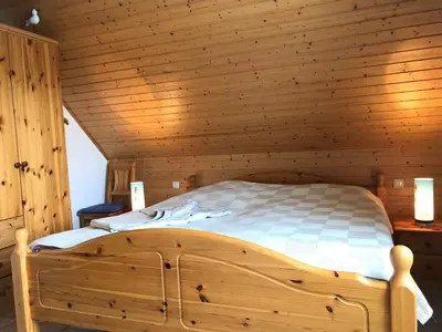 Ein Bett oder Betten in einem Zimmer der Unterkunft Ferienwohnung mit Garten