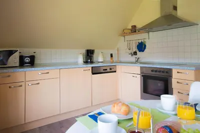 Küche/Küchenzeile in der Unterkunft Ostseebrise Reetdach 1