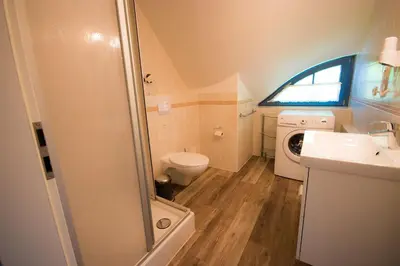 Ein Badezimmer in der Unterkunft Ostseebrise Reetdach 1