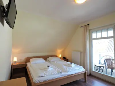 Ein Bett oder Betten in einem Zimmer der Unterkunft Kinnekulle 2
