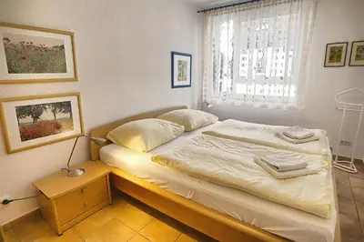 Ein Bett oder Betten in einem Zimmer der Unterkunft Residenz 