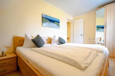 Ein Bett oder Betten in einem Zimmer der Unterkunft Die Kornblume