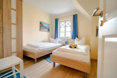 Ein Bett oder Betten in einem Zimmer der Unterkunft Die Kornblume