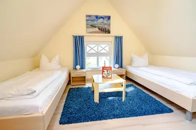 Ein Bett oder Betten in einem Zimmer der Unterkunft Die Kornblume