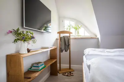 Ein Bett oder Betten in einem Zimmer der Unterkunft Ferienhaus Seeadler 11