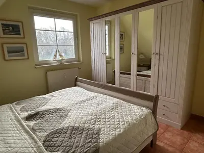 Ein Bett oder Betten in einem Zimmer der Unterkunft K&S Ferienwohnungen