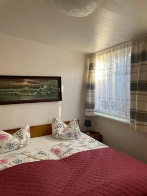 Ein Bett oder Betten in einem Zimmer der Unterkunft Meyers Veranda