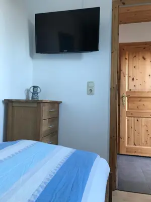 Ein Bett oder Betten in einem Zimmer der Unterkunft Meyers Veranda