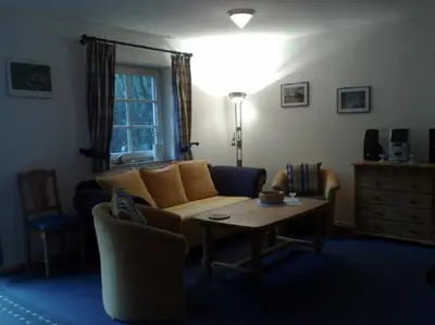 Ein Sitzbereich in der Unterkunft Haus Weidenhof App 1