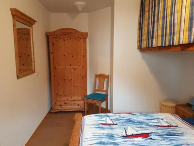 Ein Bett oder Betten in einem Zimmer der Unterkunft Haus Weidenhof App 1