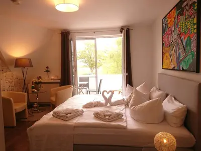 Ein Bett oder Betten in einem Zimmer der Unterkunft Pension Amo Marem