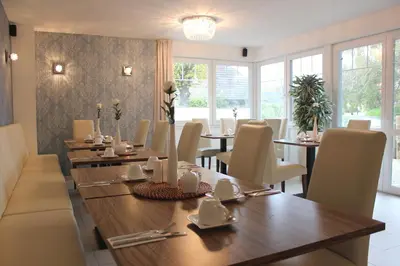 Ein Sitzbereich in der Unterkunft Pension Amo Marem