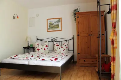 Ein Bett oder Betten in einem Zimmer der Unterkunft Ostseehaus Prerow