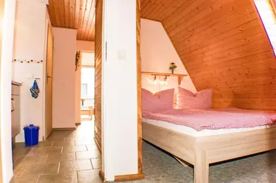 Ein Bett oder Betten in einem Zimmer der Unterkunft Ferienwohnung Zander