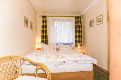 Ein Bett oder Betten in einem Zimmer der Unterkunft Ferienwohnung Zander