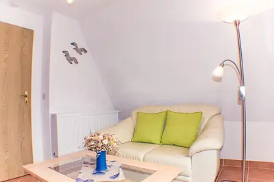 Ein Sitzbereich in der Unterkunft Ferienwohnung Zander