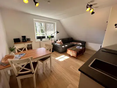 Ein Sitzbereich in der Unterkunft Ferienwohnung Lasse in Wieck