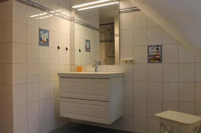 Ein Badezimmer in der Unterkunft Ferienwohnung Lasse in Wieck