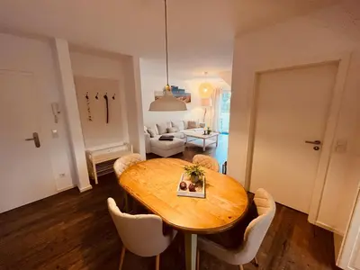 Ein Sitzbereich in der Unterkunft Ferienwohnung London in Born