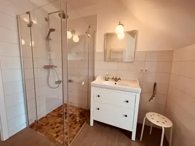 Ein Badezimmer in der Unterkunft Ferienwohnung London in Born