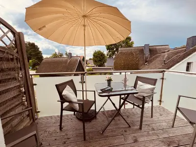 Ein Balkon oder eine Terrasse in der Unterkunft Ferienwohnung London in Born