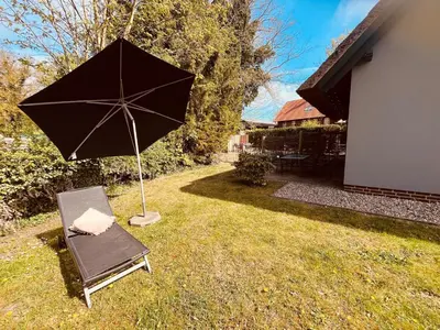 Ein Garten an der Unterkunft Ferienwohnung Kimi in Wieck