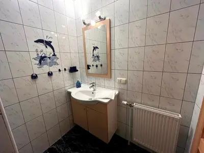 Ein Badezimmer in der Unterkunft Ferienwohnung Kimi in Wieck