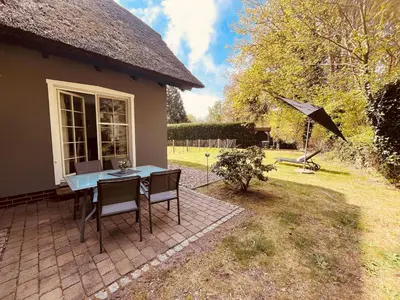 Ein Garten an der Unterkunft Ferienwohnung Kimi in Wieck