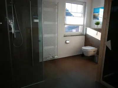 Ein Badezimmer in der Unterkunft Ferienhaus Finja in Born