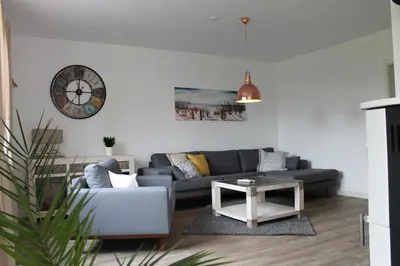 Ein Sitzbereich in der Unterkunft Ferienhaus Finja in Born