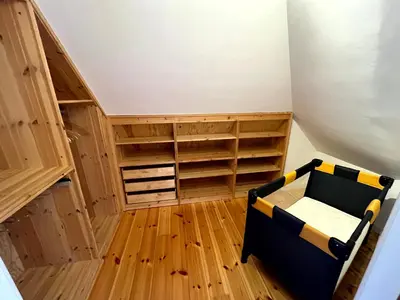 Ein Bett oder Betten in einem Zimmer der Unterkunft Ferienhaus Fiete in Wieck