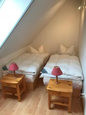 Ein Bett oder Betten in einem Zimmer der Unterkunft Ferienhaus mit Sauna