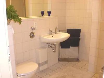Ein Badezimmer in der Unterkunft Achtern - Diek - am Strand