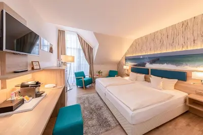 Ein Bett oder Betten in einem Zimmer der Unterkunft Hotel Blinkfüer