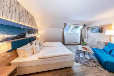 Ein Bett oder Betten in einem Zimmer der Unterkunft Hotel Blinkfüer