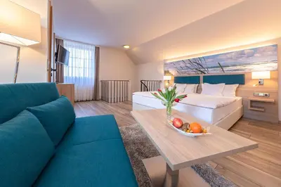 Ein Sitzbereich in der Unterkunft Hotel Blinkfüer